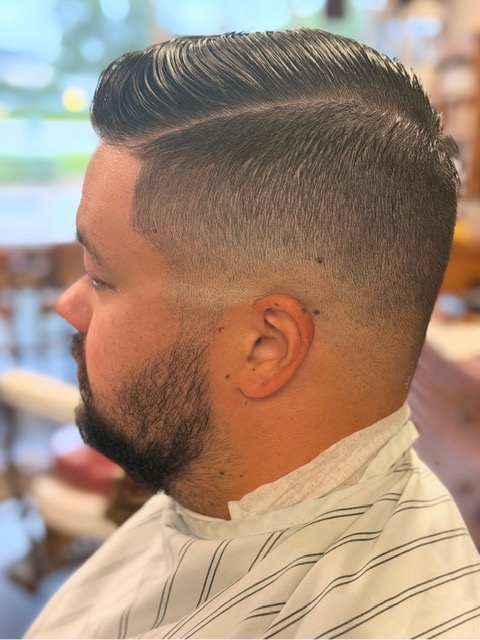 Textured pompadour with skin fade